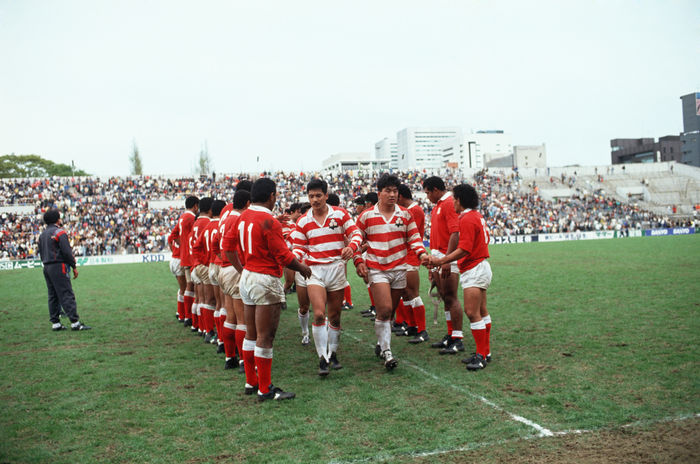 1991 Rugby World Cup Asia Qualifier Japan vs Tonga  L to R  Seiji Hirao, Osamu Ota  JPN  APRIL 8, 1990   Rugby :. Seiji Hirao of Japan shakes hands with Tonga player after the Asian qualifier for the 1991 IRB World Cup match between Japan and Tonga in Japan.  Photo by Shinichi Yamada AFLO   0348 .