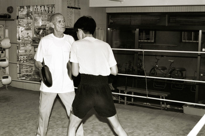 Eddie Townsend, Hiroki Ioka
1980s - Boxing :.
Boxing trainer Eddie Townsend (L) trains Hiroki Ioka (R) during a training session at Green Tsuda Boxing Gym in Osaka, Japan.
(Photo by Mikio Nakai/AFLO) [0046].