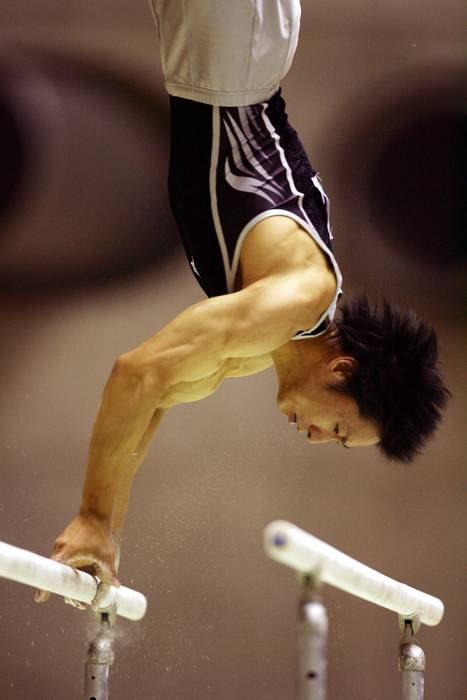 Isao Yoneda, Isao Yoneda
MAY 5, 2005 - Artistic Gymnastics : Isao Yoneda in action during the 38th World Championships Secondary Trials Day 2(Men),the parallel bars at 1st Yoyogi (Photo by Jun Tsukida/AFLO SPORT) (003)