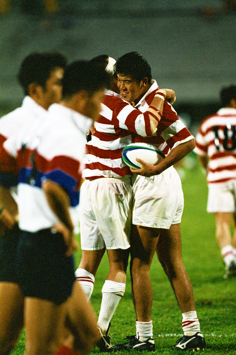 Japan team group (JPN),
OCTOBER 24, 1998 - Rugby : Japan players celebrate as South Korea players look dejected at the end of the IRB World Cup 1999 Asian Qualify match between Japan 40-12 South Korea at National Stadium in Singapore. 
(Photo by Koji Aoki/AFLO SPORT) [0008]