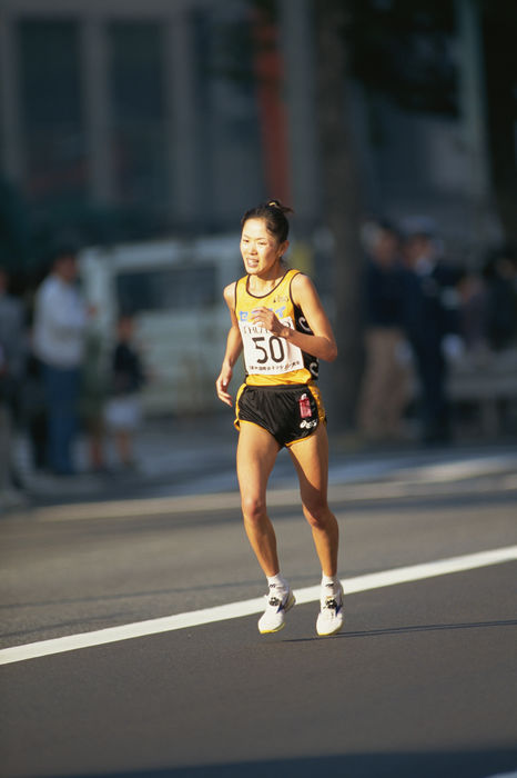 Azumi Miyazaki (JPN)
NOVEMBER 15, 1998 - Marathon : Azumi Miyazaki of Japan runs during the 20th Tokyo International Women's Marathon in Tokyo, Japan.
Azumi Miyazaki of Japan runs during the 20th Tokyo International Women's Marathon in Tokyo, Japan.
 (Photo by Jun Tsukida/AFLO SPORT) [0003].