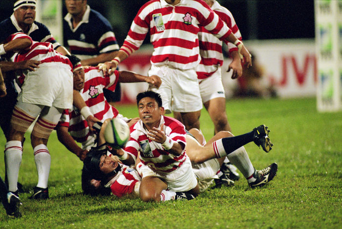 Masami Horikoshi (JPN), Masami Horikoshi of Japan
OCTOBER 31, 1998 - Rugby : Masami Horikoshi of Japan passes the ball during the IRB World Cup 1999 Asian Qualify match between Japan 47-7 Hong Kong at National Stadium in Singapore.
 (Photo by Jun Tsukida/AFLO SPORT) [0003].