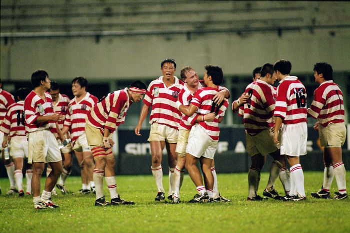 Japan national team group (JPN),
OCTOBER 31, 1998 - Rugby : Japan national team players celebrate after winning the IRB World Cup 1999 Asian Qualify match between Japan 47-7 Hong Kong at National Stadium in Singapore.
 (Photo by Jun Tsukida/AFLO SPORT) [0003]
