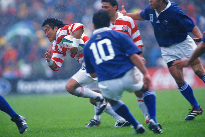 1999 Rugby World Cup First round league Pool D Tsutomu Matsuda  JPN  OCTOBER 3, 1999   Rugby : Tsutomu Matsuda of Japan runs with the ball during the IRB World Cup 1999 Pool D match between Japan 9 43 Samoa at Racecourse Ground  Photo by Jun Tsukida AFB    Photo by Jun Tsukida AFLO SPORT   0003 .