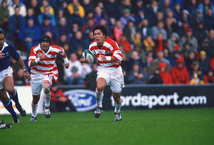 1999 Rugby World Cup First round league Pool D Daisuke Ohata  JPN , OCTOBER 3, 1999   Rugby : Daisuke Ohata of Japan runs with the ball during the IRB World Cup 1999 Pool D match between Japan 9 43 Samoa at Racecourse Ground in Wrexham, Wales.   Photo by Jun Tsukida AFLO SPORT   0003 .
