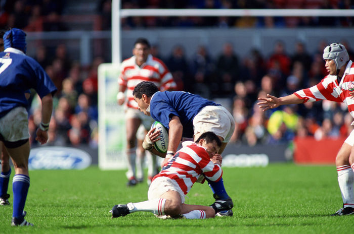 1999 Rugby World Cup First round league Pool D Keiji Hirose  JPN  OCTOBER 3, 1999   Rugby : Keiji Hirose of Japan tackles during the IRB World Cup 1999 Pool D match between Japan 9 43 Samoa at Racecourse Ground in Wrexham, Wales. Samoa at Racecourse Ground in Wrexham, Wales.   Photo by Jun Tsukida AFLO SPORT   0003 .