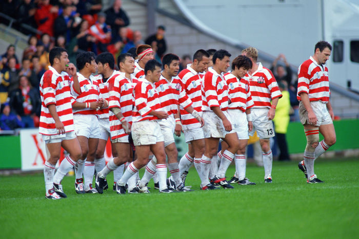 1999 Rugby World Cup First round league Pool D Japan national team group  JPN , OCTOBER 3, 1999   Rugby : Japan team players look dejected after losing the IRB World Cup 1999 Pool D match between Japan 9 43 Samoa at Racecourse Ground in Wrexham, Wales.   Photo by Jun Tsukida AFLO SPORT   0003 