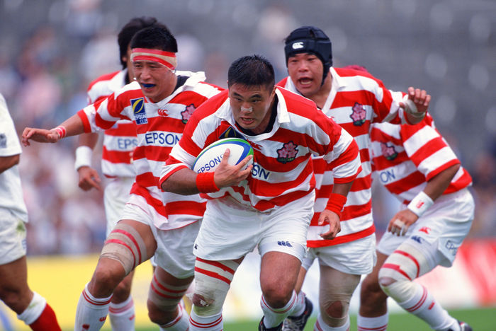Kohei Oguchi (JPN)
JUNE 3, 2000 - Rugby : Kohei Oguchi of Japan runs with the ball during the Epson Cup Pacific Rim Championship 2000 match between Japan 25-26 Tonga at Prince Chichibu Memorial Rugby Stadium in Tokyo, Japan.
 (Photo by Jun Tsukida/AFLO SPORT) [0003].