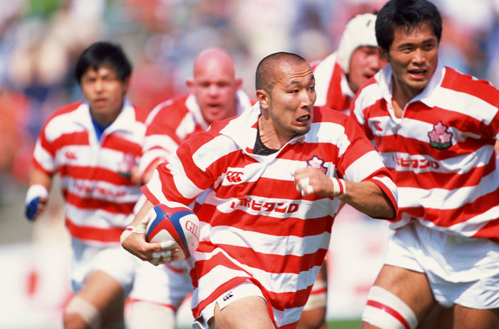 Takeomi Ito (JPN)
MAY 26, 2002 - Rugby : Takeomi Ito of Japan runs with the ball during the Lipovitan D Challenge 2002 match between Japan 29-41 Tonga at Kumagaya Sports Culture Park in Saitama, Japan.
 (Photo by Jun Tsukida/AFLO SPORT) [0003].