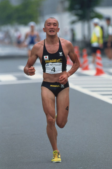 Hiroyuki Nishiuchi (JPN)
JULY 18, 1999 - Triathlon : Hiroyuki Nishiuchi of Japan runs during the 1999 Sprint Triathlon National Championships at Rainbow Town in Tokyo, Japan.
 (Photo by Jun Tsukida/AFLO SPORT) [0003].