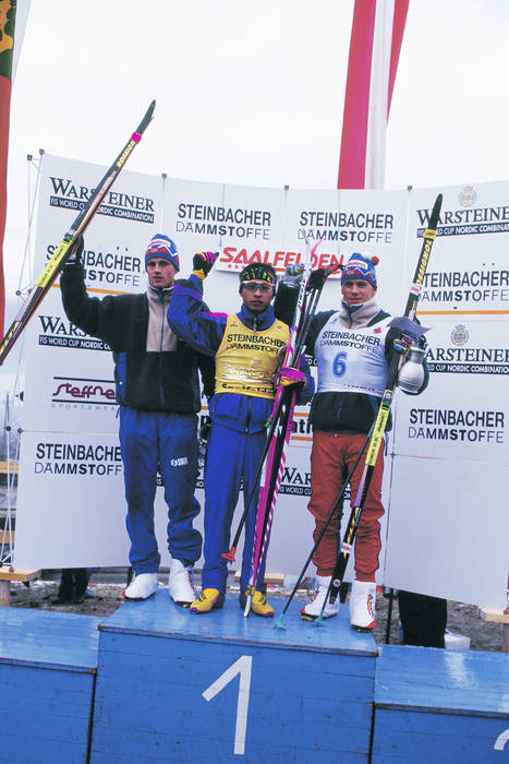 1993 Nordic Combined World Cup  L to R  Fred Bare Lundberg  NOR , Kenji Ogiwara  JPN , Kunt Tore Apeland  NOR  DECEMBER 5, 1993   Nordic Combined :. Kenji Ogiwara of Japan celebrates on the podium during the FIS World CUP of Nordic Combined Individual Event.  Photo by Koji Aoki AFLO SPORT   008 