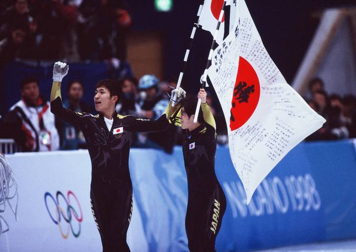 1998 Nagano Olympics, Men s 500m final, Nishitani wins gold, Uematsu wins bronze. Takafumi Nishitani  JPN , Hitoshi Uematsu  JPN  FEBRUARY 21, 1998   Short Track : Takafumi Nishitani  L  and Hitoshi Uematsu  R  of Japan celebrate after Nishitani won the gold medal and Uematsu won the bronze medal in the Mens Short Track Speed Skating 500m Final at the NAGANO 1998 Winter Olympic Games at the White Ring in Nagano, Japan.   Photo by Jun Tsukida AFLO SPORT   003 