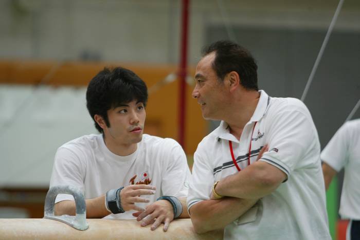 (L to R) Naoya Tsukahara,Mitsuo Tsukahara coach, MAY 28,2004 - Artistic Gymnastics : National Team Training at Japan Institute of sports sciences. Tokyo.Japan. (Photo by Jun Tsukida/AFLO SPORT) (003)