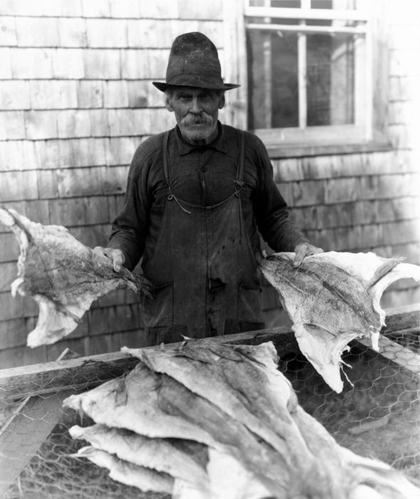 FL3261, ANCESTRAL PHOTO; Man and dried fish