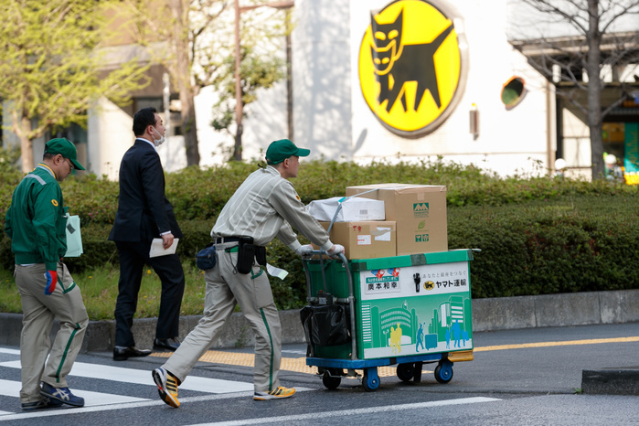 Yamato Transport to increase delivery fees for first time in 27 years A Yamato Transport worker pushes a trolley in the Ginza district of Tokyo on April 14, 2017, Japan. Japanese delivery company Yamato Transport Co. decided to increase its base shipping prices for first time in 27 years during a board meeting held on Thursday. The shipping company aims to conclude negotiations with key clients including Amazon Japan G.K. in the first half of fiscal 2017.  Photo by Rodrigo Reyes Marin AFLO 
