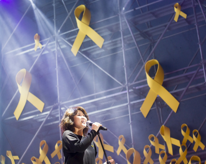 South Korean singer Kwon Jin won performs during a rally on the eve of the third anniversary of Sewol ferry disaster in Seoul Kwon Jin Won, Apr 15, 2017 : South Korean singer Kwon Jin won performs during a rally on the eve of the third anniversary of Sewol ferry disaster in Seoul, South Korea. The Sewol Ferry sank off South Korea s southwestern coast near Jindo on April 16, 2014 during a journey from Incheon to Jeju. The Ferry was carrying 475 crew and passengers, mostly high school students on a school trip. More than 300 people died and nine are still missing. The Sewol was built in Japan in 1994 and it was decommissioned ship already when South Korea imported it from Japan in late 2012. South Korean government led by at the time President Lee Myung Bak increased the maximum ship age from 20 to 30 years in 2009 as part of a drive to relax regulations, local media reported.  Photo by Lee Jae Won AFLO   SOUTH KOREA 