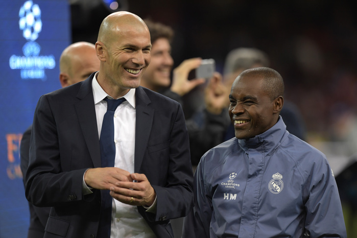 UEFA Champions League Real wins second consecutive championship for the first time in its history  L R  Zinedine Zidane, Hamidou Msaidie  Real , JUNE 3, 2017   Football   Soccer : Real Madrid head coach Zinedine Zidane celebrates with assistant coach Hamidou Msaidie after winning the UEFA Champions League Final match between Juventus 1 4 Real Madrid at Millennium Stadium in Cardiff, Wales.  Photo by FAR EAST PRESS AFLO 