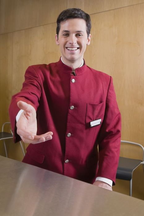 Portrait of a waiter smiling