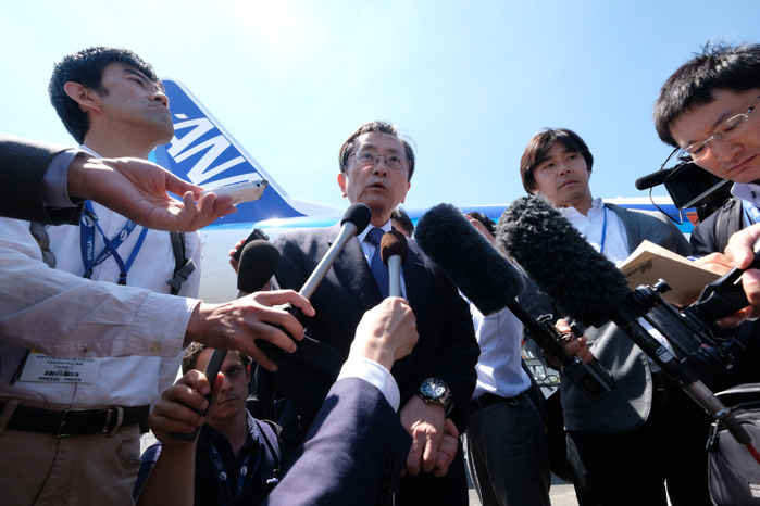 2017 Paris Air Show Osamu Shinobe, ANA Holdings Inc. s Vice Chairman, is surrounded by reporters in front of the third Flight Test Aircraft  FTA 3  of Mitsubishi Regional Jet  MRJ  at the Le Bourget Airport, a day before the opening of the 2017 Paris Air Show on June18, 2017, in Paris, France.  Photo by Yuriko Nakao AFLO 