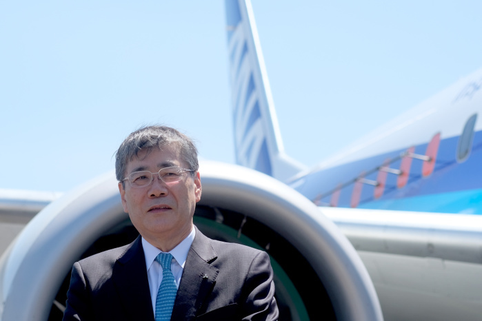 2017 Paris Air Show Shunichi Miyanaga, Mitsubishi Heavy Industries  President and Chief Executive Officer, poses in front of the third Flight Test Aircraft  FTA 3  of Mitsubishi Regional Jet  MRJ  at the Le Bourget Airport, a day before the opening of the 2017 Paris Air Show on June18, 2017, in Paris, France.  Yuriko Nakao AFLO 