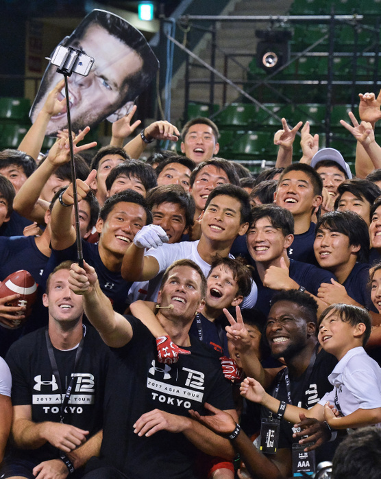 Tom Brady hosts Asia tour for Under Armourr Tom Brady, UNDER ARMOUR, June 21, 2017, Tokyo, Japan : New England Patriots quarterback Tom Brady  takes a selfie after giving instructions to young players during a football clinic in Tokyo, Japan on June 21, 2017.  Photo by AFLO 