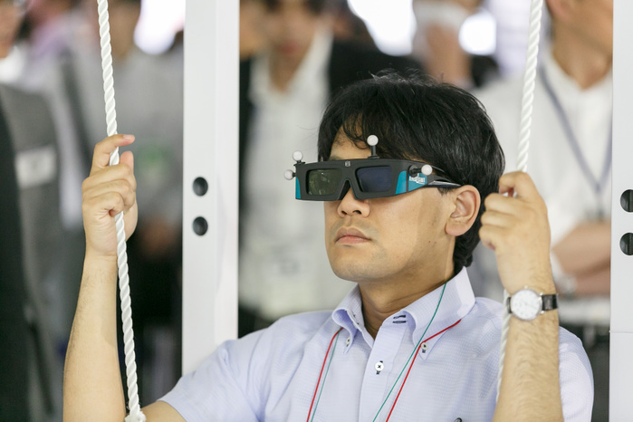 CONTENT TOKYO 2017 A man tests an augmented reality simulator during the CONTENT TOKYO 2017 at Tokyo Big Sight on June 28, 2017, Tokyo, Japan. New technologies such as Artificial Intelligence  AI , Virtual Reality  VR  and Augmented Reality  AR  are introduced during the three day trade show where 1760 exhibitors from the entertainment content industry will attend. Organizers expect that the event will draw some 63,000 visitors.  Photo by Rodrigo Reyes Marin AFLO 