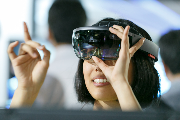 CONTENT TOKYO 2017 A woman tests a HoloLens virtual reality glasses at CONTENT TOKYO 2017 at Tokyo Big Sight on June 28, 2017, Tokyo, Japan. New technologies such as Artificial Intelligence  AI , Virtual Reality  VR  and Augmented Reality  AR  are introduced during the three day trade show where 1760 exhibitors from the entertainment content industry will attend. Organizers expect that the event will draw some 63,000 visitors.  Photo by Rodrigo Reyes Marin AFLO 