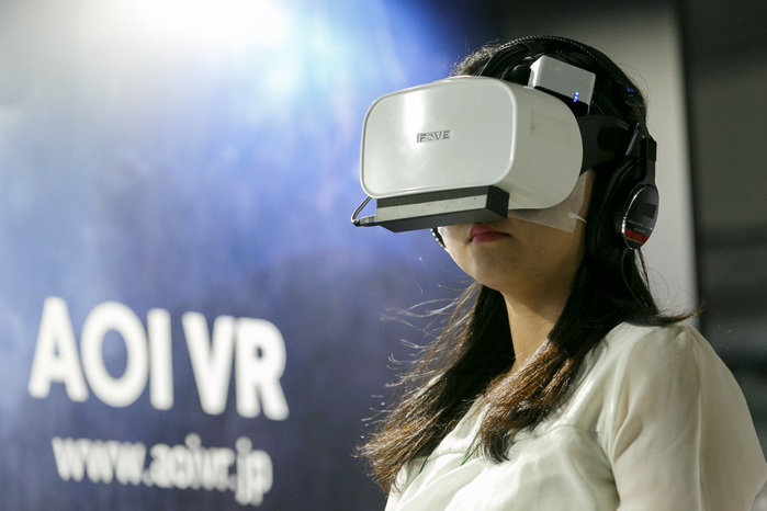 CONTENT TOKYO 2017 A woman tests an AOI VR virtual reality glasses at CONTENT TOKYO 2017 at Tokyo Big Sight on June 28, 2017, Tokyo, Japan. New technologies such as Artificial Intelligence  AI , Virtual Reality  VR  and Augmented Reality  AR  are introduced during the three day trade show where 1760 exhibitors from the entertainment content industry will attend. Organizers expect that the event will draw some 63,000 visitors.  Photo by Rodrigo Reyes Marin AFLO 