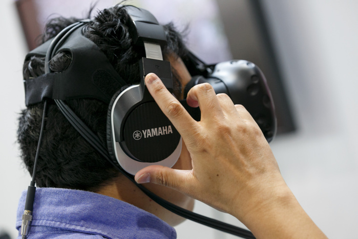 CONTENT TOKYO 2017 A man tests a Yamaha   ViReal   3D Audio headphones at CONTENT TOKYO 2017 at Tokyo Big Sight on June 28, 2017, Tokyo, Japan. New technologies such as Artificial Intelligence  AI , Virtual Reality  VR  and Augmented Reality  AR  are introduced during the three day trade show where 1760 exhibitors from the entertainment content industry will attend. Organizers expect that the event will draw some 63,000 visitors.  Photo by Rodrigo Reyes Marin AFLO 