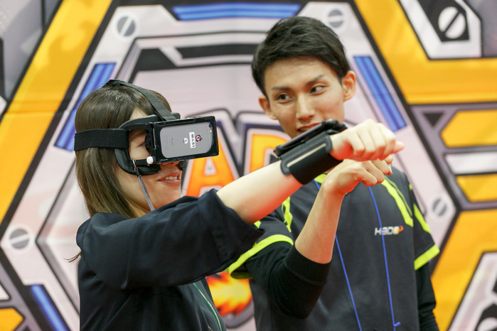 CONTENT TOKYO 2017 A woman tests a virtual reality glasses during the CONTENT TOKYO 2017 at Tokyo Big Sight on June 28, 2017, Tokyo, Japan. New technologies such as Artificial Intelligence  AI , Virtual Reality  VR  and Augmented Reality  AR  are introduced during the three day trade show where 1760 exhibitors from the entertainment content industry will attend. Organizers expect that the event will draw some 63,000 visitors.  Photo by Rodrigo Reyes Marin AFLO 