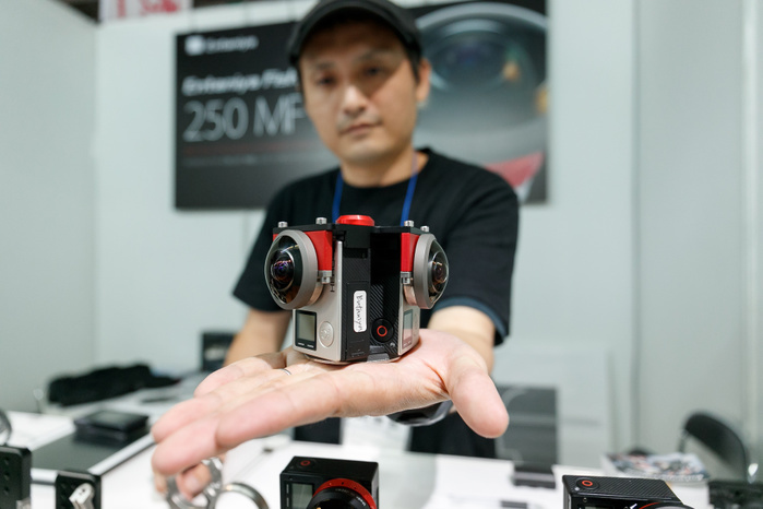 CONTENT TOKYO 2017 An exhibitor shows lenses Entaniya Fisheye set on cameras GoPro at CONTENT TOKYO 2017 at Tokyo Big Sight on June 28, 2017, Tokyo, Japan. New technologies such as Artificial Intelligence  AI , Virtual Reality  VR  and Augmented Reality  AR  are introduced during the three day trade show where 1760 exhibitors from the entertainment content industry will attend. Organizers expect that the event will draw some 63,000 visitors.  Photo by Rodrigo Reyes Marin AFLO 