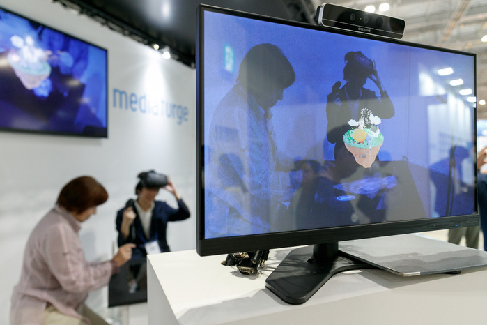 CONTENT TOKYO 2017 Visitors test an augmented reality simulator during the CONTENT TOKYO 2017 at Tokyo Big Sight on June 28, 2017, Tokyo, Japan. New technologies such as Artificial Intelligence  AI , Virtual Reality  VR  and Augmented Reality  AR  are introduced during the three day trade show where 1760 exhibitors from the entertainment content industry will attend. Organizers expect that the event will draw some 63,000 visitors.  Photo by Rodrigo Reyes Marin AFLO 