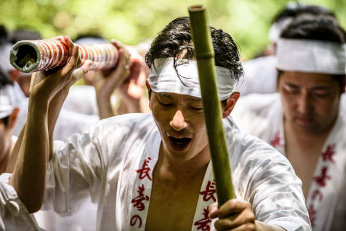 Hirahara no Taki biraki JULY 2, 2017    Men purify themselves by standing under water during Hirahara no Taki biraki, an annual event at the Hirahara Waterfall in Nishio City, Japan.   Each year, yaku otoko, men whose current age is considered unlucky or risky, participate in this ceremony, known as mizugori. Water from the falls is directed through bamboo pipes and falls on the men, purifying and protecting them in their unlucky year.  Photo by Ben Weller AFLO   JAPAN   UHU 