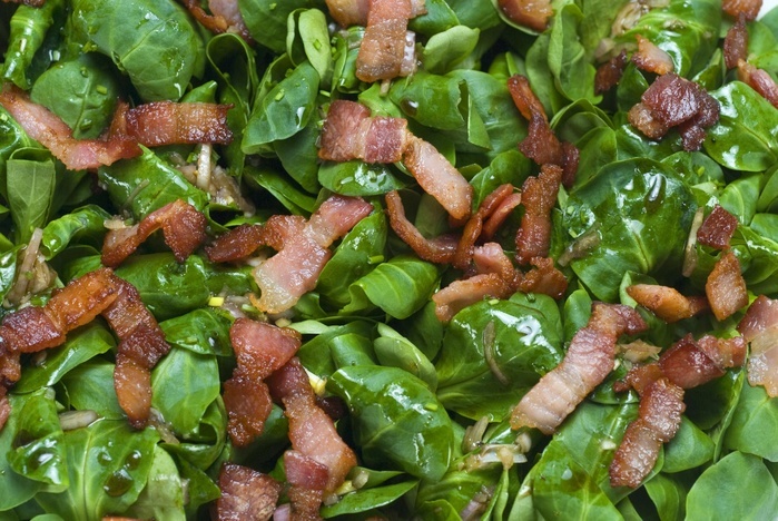 salad Field salad  Valerianella locusta  with roasted bacon strips