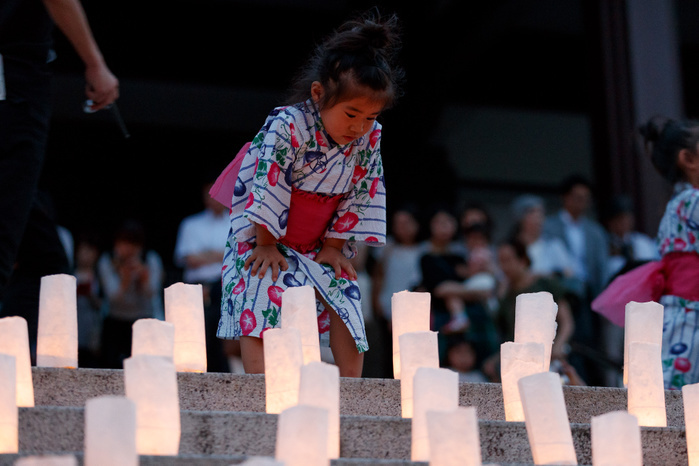 Japan celebrates Tanabata Festival A girl dressed in traditional Japanese kimono looks at the lanterns on display during the Tanabata festival at Zozoji Temple on July 7, 2017, Tokyo, Japan. About 4000 lanterns, made by students, are displayed along the stairs of the temple simulating the Milky Way as part of Tanabata festival at Zozoji Temple. The annual celebration of Tanabata commemorates the legend of two lovers separated by the Milky Way who only meet once a year on the seventh day of the seventh month. The festival has been held since the Edo era and many people celebrate it by writing wishes on colorful paper  Tanzaku  which they then hang on bamboo.  Photo by Rodrigo Reyes Marin AFLO 