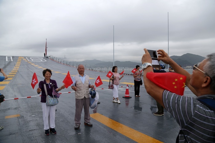 Hong Kong people enjoy the first public ship tour of China s aircraft carrier Liaoning Hong Kong people enjoy the first public ship tour of China s aircraft carrier Liaoning whose sailors of the flotilla will attend local activities to celebrate the 20th anniversary of the People s Liberation Army being stationed in the HKSAR in Hongkong,China on 8th July 2017.