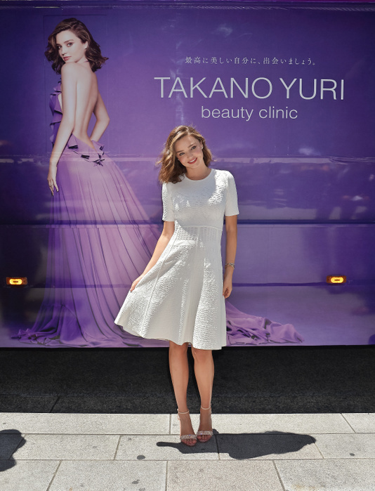 Miranda Kerr promotes in Tokyo Miranda Kerr, Tokyo, Japan, July 11, 2017 : Model Miranda Kerr poses for camera in front of the campaign bus for Yuri Takano beauty clinic at Ginza shopping district in Tokyo, Japan on July 11, 2017.