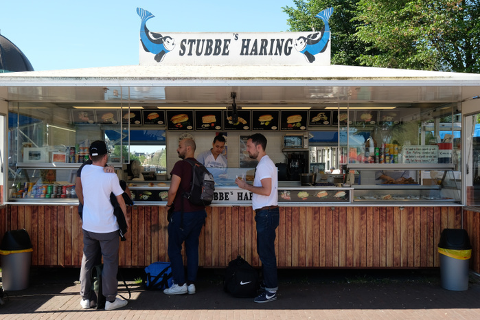 Amsterdam, The Netherlands People stand outside a fish stand selling raw herring  Haring in Dutch  in Amsterdam, the Netherlands, May 26, 2017.  Photo by Yuriko Nakao AFLO 