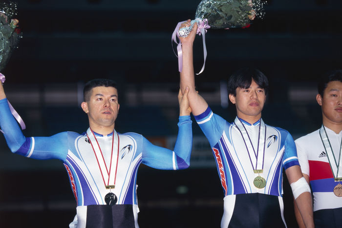 Hideki Yamada, Noriaki Mabuchi (JPN)
JUNE 6, 1999 - Cycling :.
Hideki Yamada (gold) and Noriaki Mabuchi (L, silver) of Japan celebrate on the podium after the Men's Sprint of the 19th Asian Cycling Championships Track Hideki Yamada (gold) and Noriaki Mabuchi (silver) of Japan celebrate on the podium after the Men's Sprint of the 19th Asian Cycling Championships Track.
 (Photo by Jun Tsukida/AFLO SPORT) [0003].