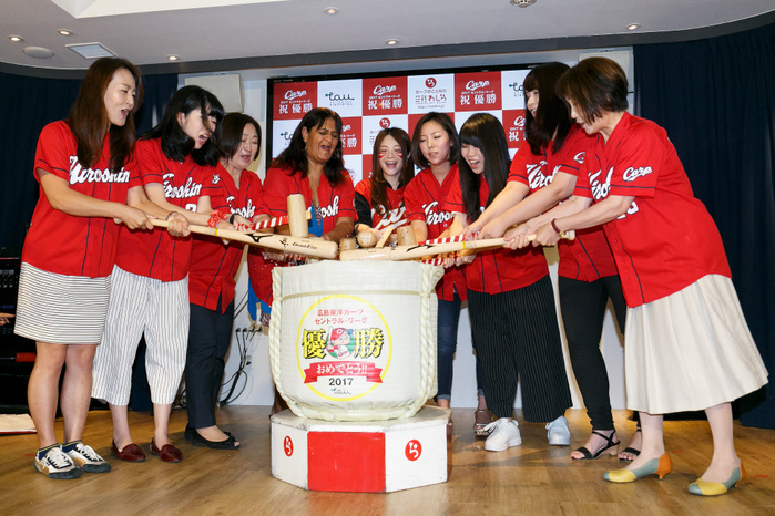 Carp baseball fans buy souvenir 2017 champions  t shirts at the Hiroshima Shop in Ginza Hiroshima Carp baseball team fans hit the top led of the sake barrel to celebrate team s victory at Hiroshima Brand Shop TAU in Ginza on September 19, 2017, Tokyo, Japan. Hundreds of Carp fans lined up from early morning to buy special victory t shirts after Hiroshima won its second straight Central League title, beating the Hanshin Tigers 3 2 on Monday afternoon, September 18.  Photo by Rodrigo Reyes Marin AFLO 