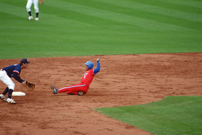 2000 Sydney Olympics Yasser Gomez  CUB , SEPTEMBER 26, 2000   Baseball : Yasser Gomez  5 of Cuba slides into second base during the Baseball semifinal game between Japan 0 3 Cuba at the 2000 Sydney Olympic Games at Baseball Stadium in the Olympic Park in Sydney, Australia.  Photo by AFLO SPORT   0006 