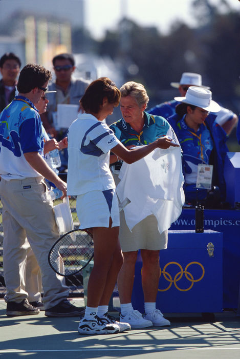 2000 Sydney Olympics Shinobu Asagoe  JPN  SEPTEMBER 19, 2000   Tennis : Shinobu Asagoe of Japan is checked her shirt by officials before the Women s Tennis Singles 1st rmd match at the 2000 Sydney Olympic Games at NSW Tennis Center in Sydney, Australia.  Photo by AFLO SPORT   0006 .