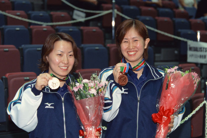 Mayu Kawagoe, Akiko Takeda (JPN)
MAY 6, 2001 - Table Tennis : Mayu Kawagoe (R) and Akiko Takeda (L) of Japan celebrate after winning the bronze medal in the Women's Doubles at the 2001 World Mayu Kawagoe (R) and Akiko Takeda (L) of Japan celebrate after winning the bronze medal in the Women's Doubles at the 2001 World Table Tennis Championships in Osaka, Japan.
(Photo by AFLO SPORT) [0006].
