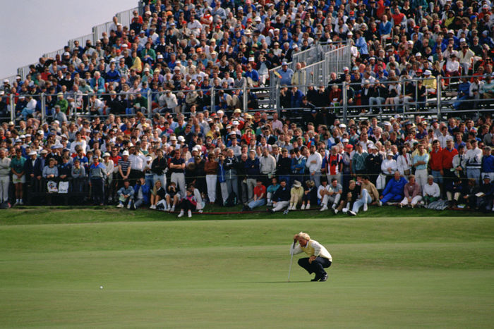 1990 British Open Greg Norman, with a large gallery watching. Reading the lines Greg Norman,July 19 22, 1990   Golf : during the British Open Golf Tournament held at St Andrews, Scotland,  Photo by Koji Aoki AFLO SPORT   0008 