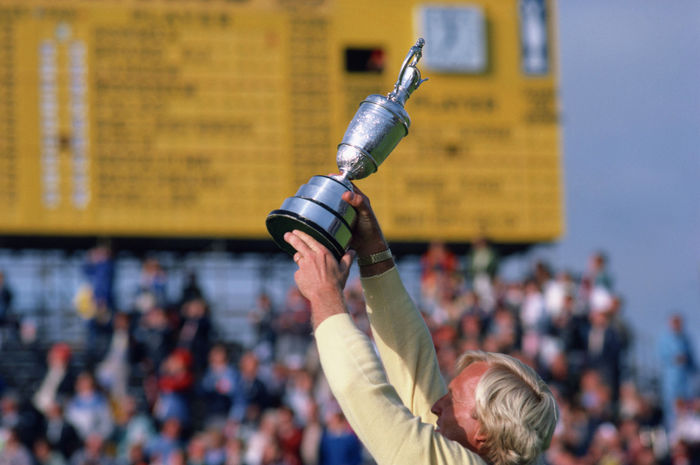 1986 British Open Awards Ceremony The winner of the 1986 British Open, Greg Norman, holds his trophy high in the air. Greg Norman Greg Norman,July 20, 1986   Golf : celebrates during the final round of the 1986 British Open Golf Championship held on July 20, 1986 at Turnberry, in Ayrshire, Scotland.  Photo by Koji Aoki AFLO SPORT   0008 