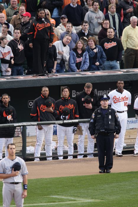 Koji Uehara (Orioles), APRIL 6, 2009 - MLB : Koji Uehara of the Baltimore Orioles stands in the 7th inning "God Bless America" during the 2009 Opening Game against the New York Yankees at Oriole Park at Camden Yards in Baltimore, USA. (Photo by Thomas Anderson/AFLO) [0903] (JAPANESE NEWSPAPER OUT)