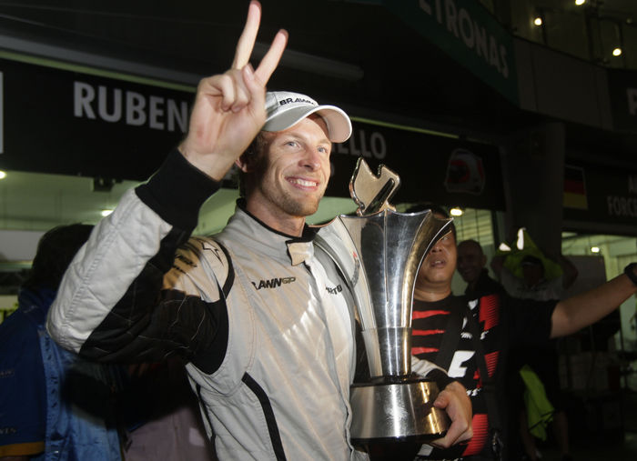 Motorsports   Formula 1: World Championship 2009, GP of Malaysia Jenson Button  Brawn GP , John Button, APRIL 5, 2009   F1 : Jenson Button of Great Britain and Brawn GP celebrates with the trophy after winning the rain curtailed Malaysian Formula One Grand Prix at the Sepang Circuit in Kuala Lumpur, Malaysia.  Photo by AFLO   0906       Local Caption         www.hoch zwei.net     copyright: HOCH ZWEI   Juergen Tap    