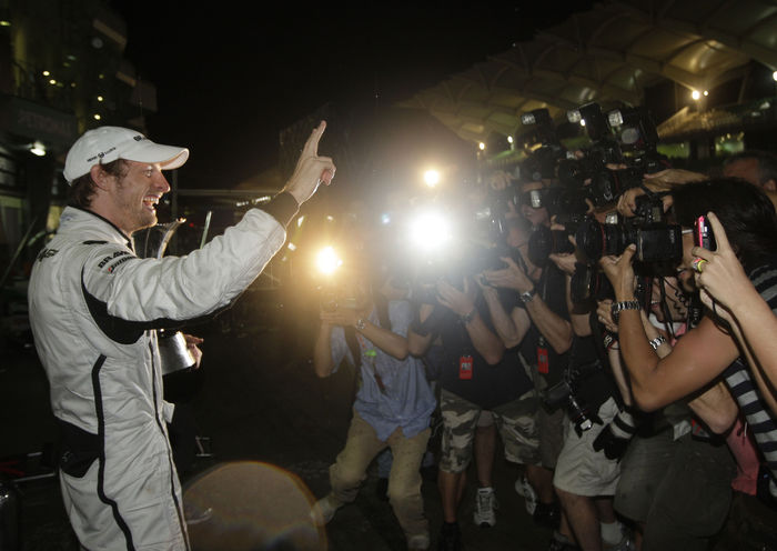 Motorsports   Formula 1: World Championship 2009, GP of Malaysia Jenson Button  Brawn GP , John Button, APRIL 5, 2009   F1 : Jenson Button of Great Britain and Brawn GP celebrates with the trophy after winning the rain curtailed Malaysian Formula One Grand Prix at the Sepang Circuit in Kuala Lumpur, Malaysia.  Photo by AFLO   0906       Local Caption         www.hoch zwei.net     copyright: HOCH ZWEI   Juergen Tap    