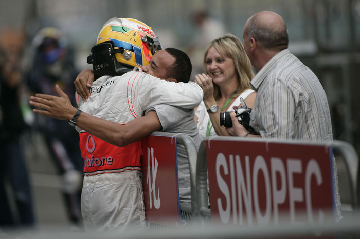 Motorsports   Formula 1: World Championship 2008, GP of China Lewis Hamilton  McLaren , OCTOBER 19, 2008   Formula One : Lewis Hamilton of Great Britain and McLaren Mercedes celebrates in parc ferme with his brother Nick Hamilton after winning the Chinese Formula One Grand Prix at the Shanghai International Circuit in Shanghai, China.  Photo by AFLO   0906      Local Caption         www.hoch zwei.net     copyright: HOCH ZWEI   Michael Kunkel    
