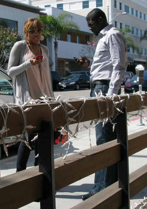 Eve, Mar 12, 2009 : Singer Eve with new boyfriend after lunch texting on her blackberry for 15 minutes. Lucky Fish Restaurant. Beverly Hills, CA, USA. Thursday, March 12, 2009. (Photo by Celebrity Vibe/AFLO) [2361]